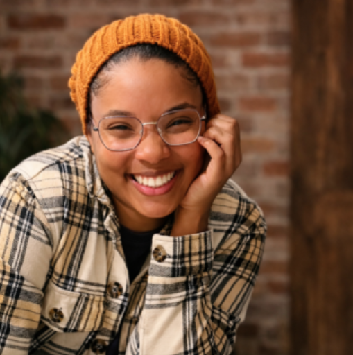 Autumn Maxwell in an orange knit hat